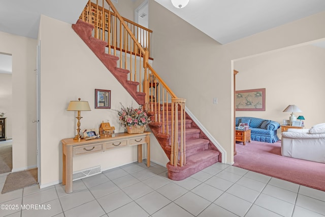 43 Winchester Dr, Howell, NJ 07731 - stairway featuring carpet and tile patterned flooring