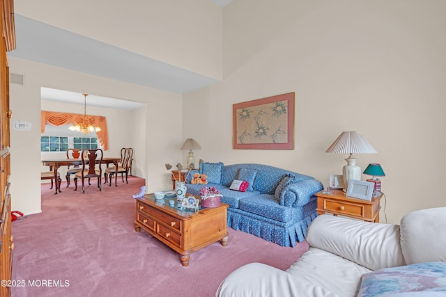 43 Winchester Dr, Howell, NJ 07731 - carpeted living room featuring a chandelier