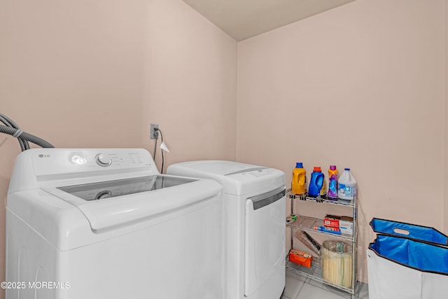 43 Winchester Dr, Howell, NJ 07731 - laundry room featuring washing machine and clothes dryer and light tile patterned floors