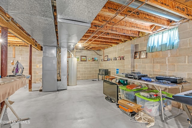 43 Winchester Dr, Howell, NJ 07731 - basement with gas water heater, heating unit, and concrete block wall