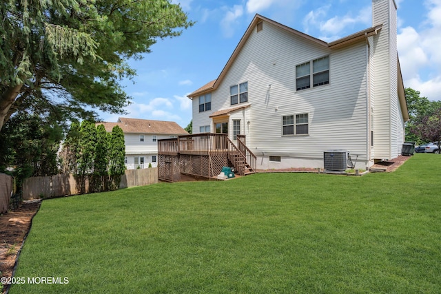 43 Winchester Dr, Howell, NJ 07731 - back of property featuring a deck, stairway, and a chimney