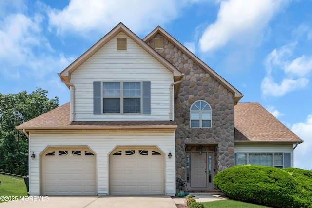 43 Winchester Dr, Howell, NJ 07731 - traditional-style home featuring concrete driveway, a garage, roof with shingles, and stone siding