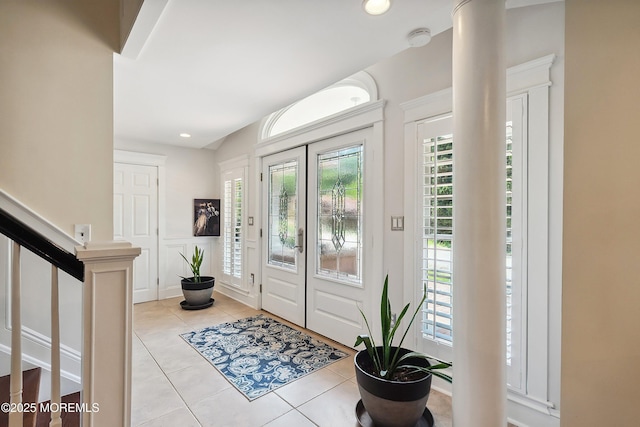 34 Sea View Ter, Highlands, NJ 07732 - foyer with light tile patterned floors, stairs, a decorative wall, wainscoting, and recessed lighting