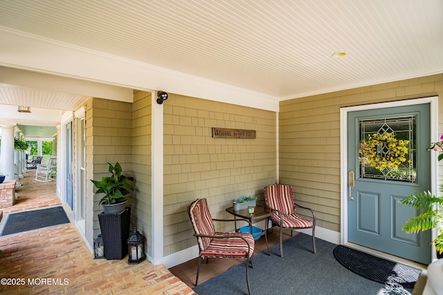 34 Sea View Ter, Highlands, NJ 07732 - doorway to property featuring a porch and a surveillance system