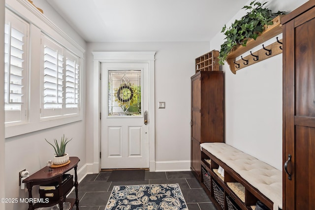 34 Sea View Ter, Highlands, NJ 07732 - mudroom with baseboards and dark tile patterned floors