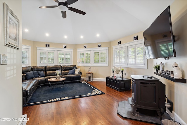 34 Sea View Ter, Highlands, NJ 07732 - living room with vaulted ceiling, ceiling fan, recessed lighting, wood finished floors, and a wood stove