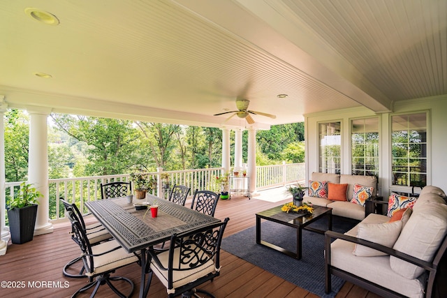 34 Sea View Ter, Highlands, NJ 07732 - wooden deck with outdoor lounge area, a ceiling fan, and outdoor dining space