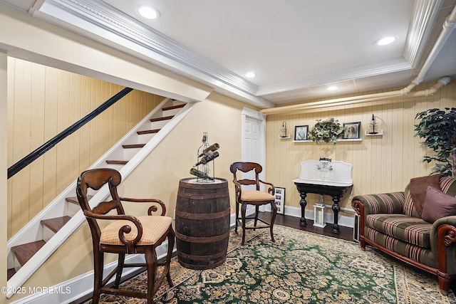 34 Sea View Ter, Highlands, NJ 07732 - living area with stairway, recessed lighting, ornamental molding, wood finished floors, and wooden walls