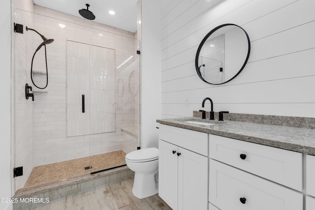 842 Arnold Ave Unit 4, Point Pleasant, NJ 08742 - bathroom with vanity, a shower stall, recessed lighting, and wood finished floors