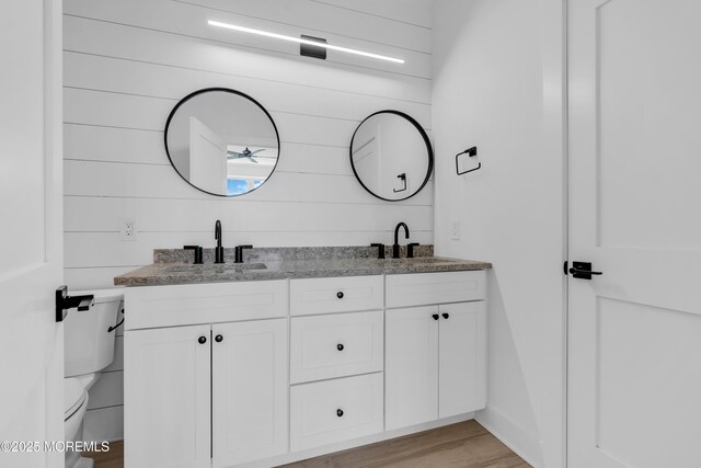 842 Arnold Ave Unit 4, Point Pleasant, NJ 08742 - bathroom featuring double vanity and wood finished floors