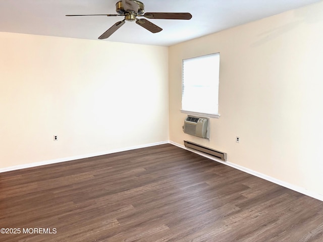 768D Hudson Pkwy, Whiting, NJ 08759 - spare room featuring a baseboard heating unit, dark wood-style flooring, a ceiling fan, and a wall mounted AC