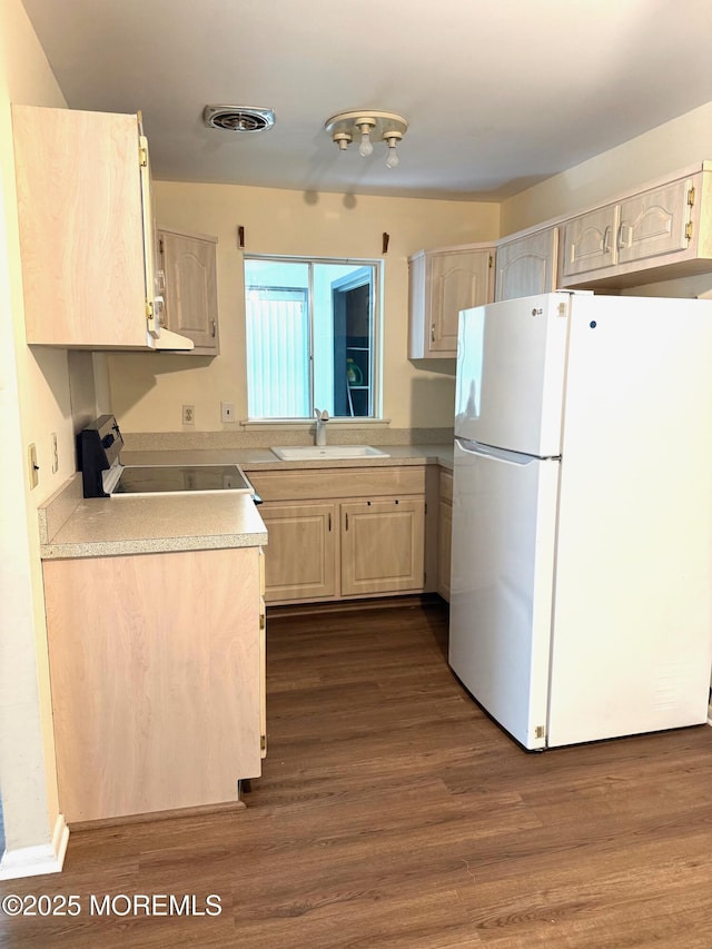 768D Hudson Pkwy, Whiting, NJ 08759 - kitchen with freestanding refrigerator, electric range oven, dark wood-style flooring, and light countertops
