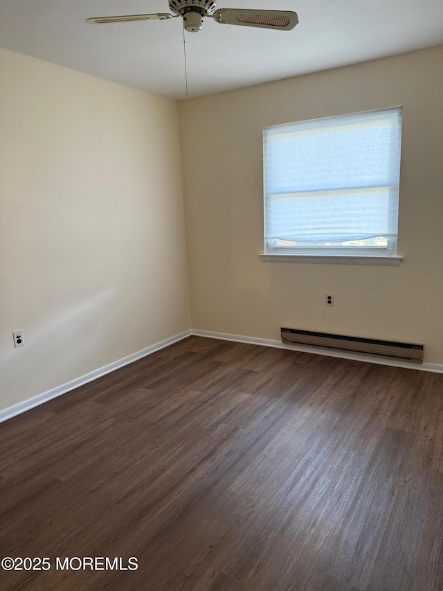 768D Hudson Pkwy, Whiting, NJ 08759 - unfurnished room featuring baseboard heating, ceiling fan, and dark wood finished floors