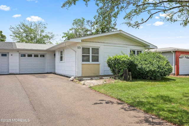13 Brooke Rd, Brick, NJ 08724 - ranch-style house with an attached garage, driveway, and a front yard