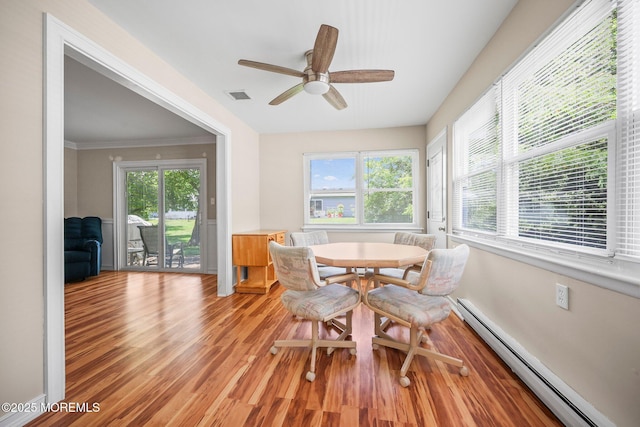 13 Brooke Rd, Brick, NJ 08724 - dining room featuring a baseboard radiator, light wood-type flooring, a ceiling fan, and ornamental molding