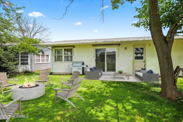 13 Brooke Rd, Brick, NJ 08724 - rear view of property featuring a yard, an outdoor living space with a fire pit, and a patio
