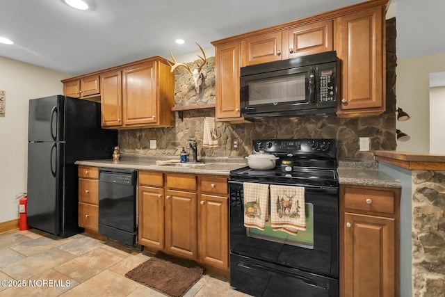 216 Main St, Port Monmouth, NJ 07758 - kitchen featuring black appliances, backsplash, brown cabinetry, and recessed lighting