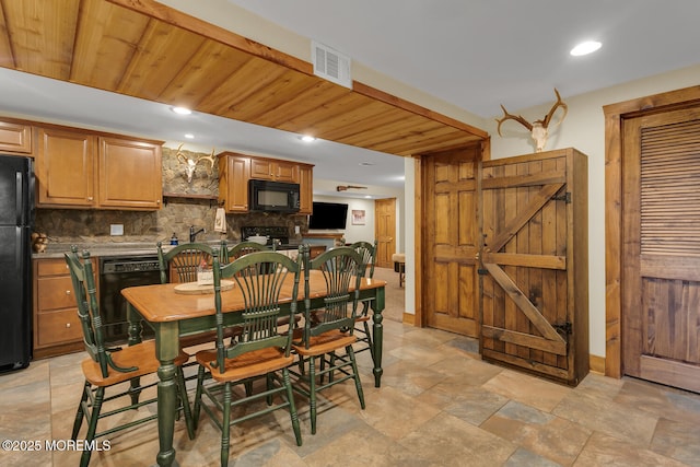 216 Main St, Port Monmouth, NJ 07758 - dining room featuring light stone finish floors and recessed lighting