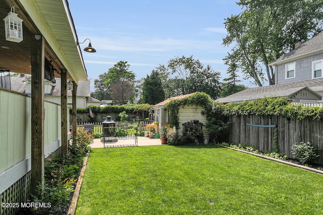 216 Main St, Port Monmouth, NJ 07758 - fenced backyard with a patio and an outdoor structure
