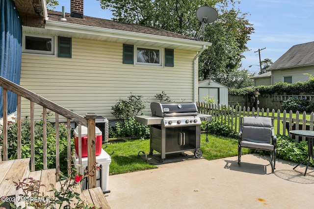 216 Main St, Port Monmouth, NJ 07758 - view of patio / terrace featuring grilling area and a storage shed