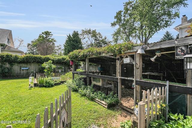 216 Main St, Port Monmouth, NJ 07758 - fenced backyard with exterior structure and an outbuilding