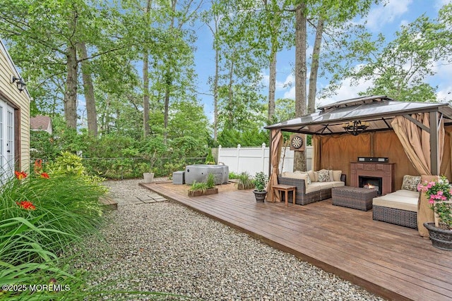 1267 Spruce St, Forked River, NJ 08731 - wooden terrace featuring a gazebo and an outdoor living space with a fireplace