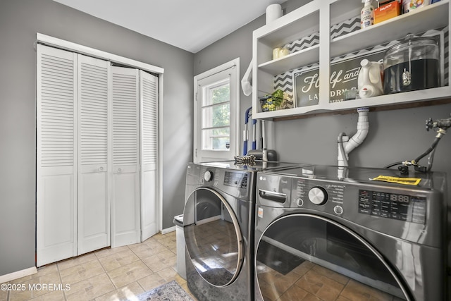 91 Newbury Rd, Howell, NJ 07731 - laundry area featuring independent washer and dryer and tile patterned floors