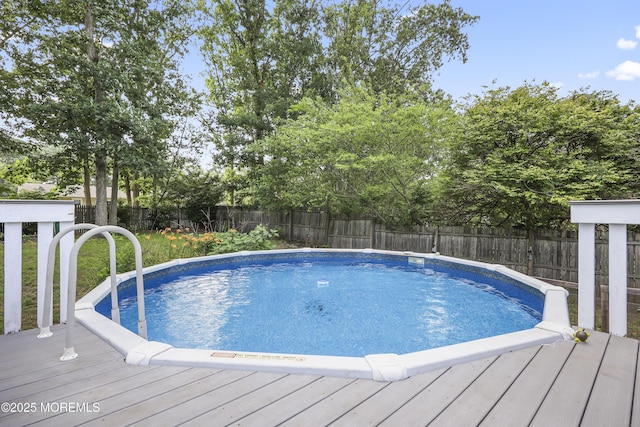 91 Newbury Rd, Howell, NJ 07731 - view of pool featuring a wooden deck and a fenced backyard
