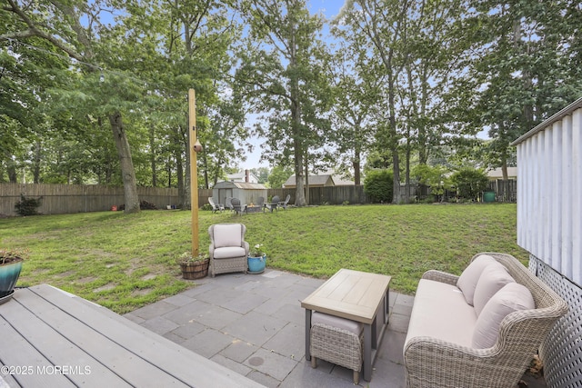 91 Newbury Rd, Howell, NJ 07731 - fenced backyard featuring a shed and a patio area