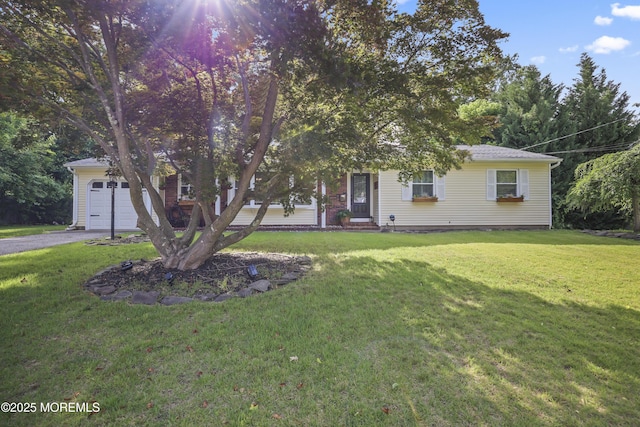 91 Newbury Rd, Howell, NJ 07731 - view of property hidden behind natural elements with a front lawn, driveway, and an attached garage