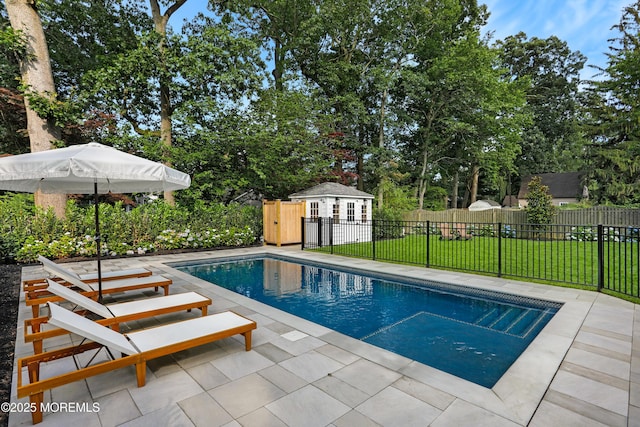 63 Bingham Ave, Rumson, NJ 07760 - view of pool featuring a patio, an outdoor structure, a storage structure, and view of scattered trees