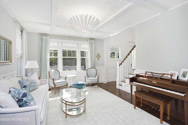 63 Bingham Ave, Rumson, NJ 07760 - living room featuring wood finished floors, beam ceiling, stairs, a wainscoted wall, and a decorative wall