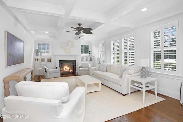 63 Bingham Ave, Rumson, NJ 07760 - living room with a glass covered fireplace, coffered ceiling, dark wood finished floors, a ceiling fan, and beam ceiling