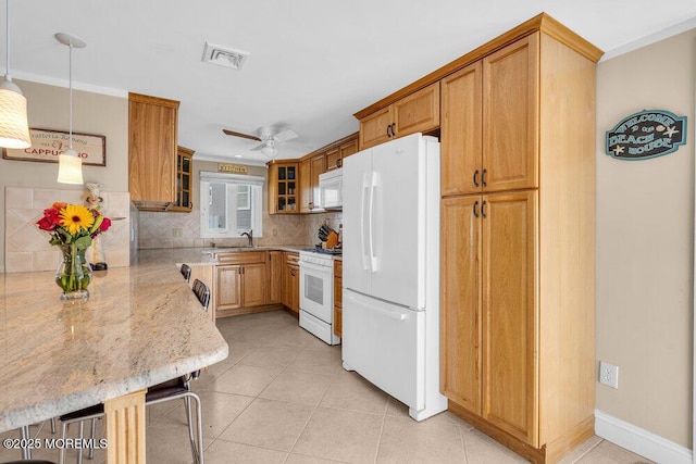 102 W Colony Rd, Lavallette, NJ 08735 - kitchen with white appliances, light stone counters, glass insert cabinets, decorative backsplash, and a ceiling fan