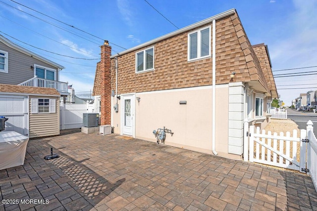 102 W Colony Rd, Lavallette, NJ 08735 - back of house with a patio area, a gate, and stucco siding