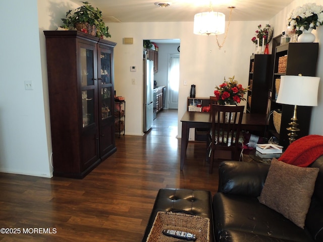 455A Chesterfield Ct, Manchester, NJ 08759 - living room featuring dark wood-type flooring and a chandelier