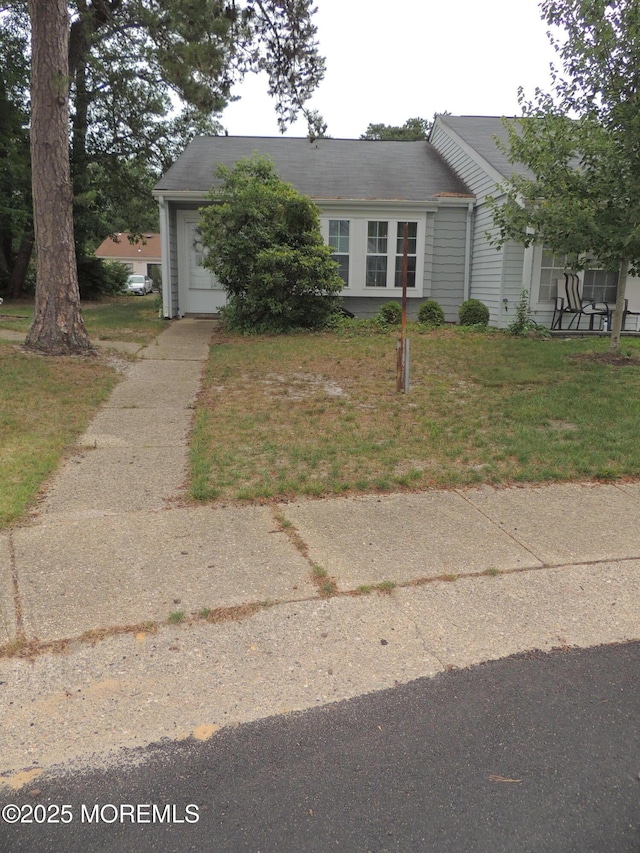 455A Chesterfield Ct, Manchester, NJ 08759 - view of front facade featuring an attached garage and concrete driveway