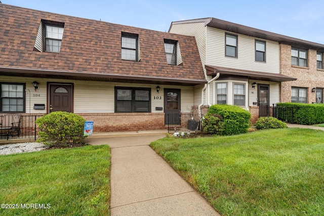 103 Village Green Way, Hazlet, NJ 07730 - view of property featuring a front yard, a shingled roof, and a porch