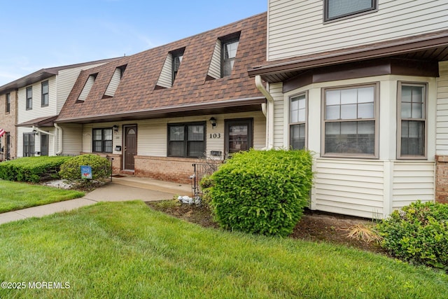 103 Village Green Way, Hazlet, NJ 07730 - multi unit property featuring a shingled roof, a front yard, and brick siding
