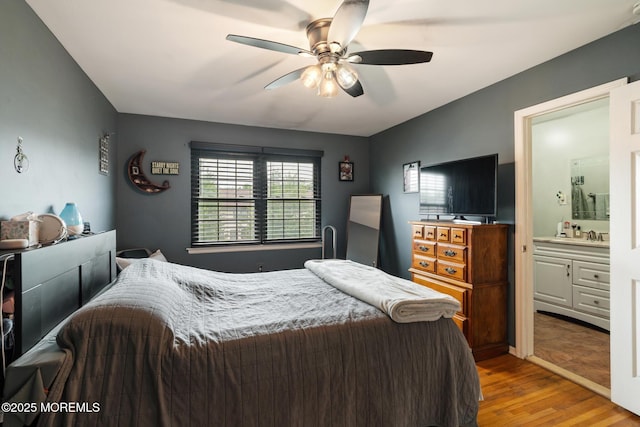 103 Village Green Way, Hazlet, NJ 07730 - bedroom with wood finished floors, ensuite bath, and a ceiling fan
