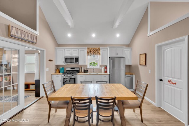 241 Hiering Ave, Seaside Heights, NJ 08751 - dining area with high vaulted ceiling, light wood-type flooring, and recessed lighting