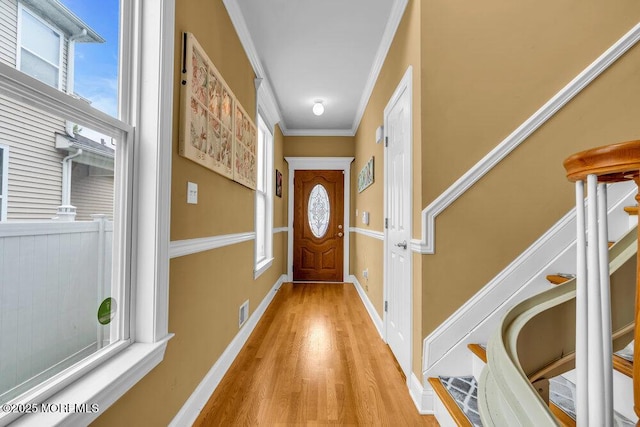 626 Anthony Ave, Toms River, NJ 08753 - doorway to outside with wood finished floors and ornamental molding