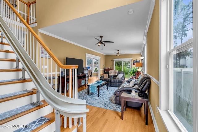 626 Anthony Ave, Toms River, NJ 08753 - living area with wood finished floors, crown molding, a ceiling fan, and stairs