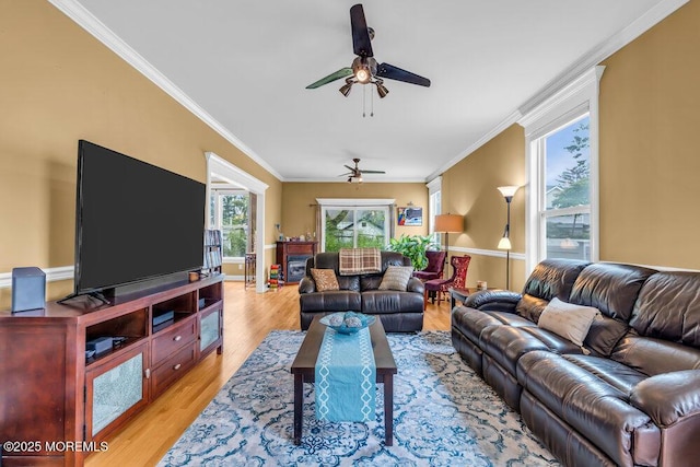 626 Anthony Ave, Toms River, NJ 08753 - living room with ceiling fan, crown molding, and light wood finished floors