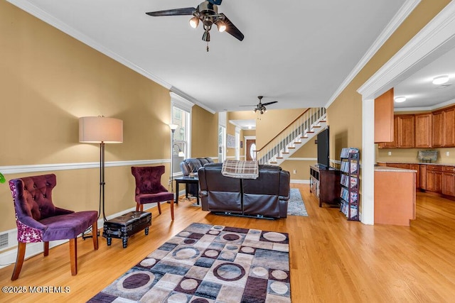 626 Anthony Ave, Toms River, NJ 08753 - living area featuring ceiling fan, light wood-style flooring, stairs, and crown molding