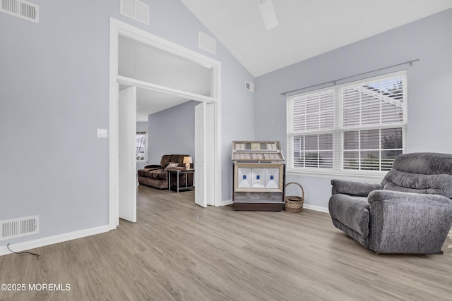 10 Ignatius Dr, Manchester, NJ 08759 - sitting room featuring wood finished floors, high vaulted ceiling, and a ceiling fan