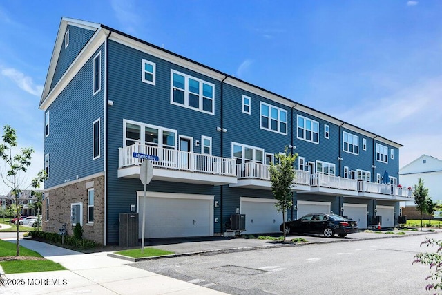 25 Signal Ave, Oceanport, NJ 07757 - view of building exterior with an attached garage