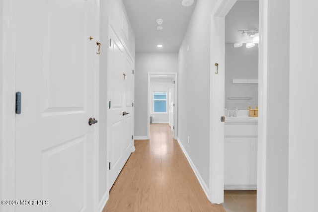 25 Signal Ave, Oceanport, NJ 07757 - corridor with light wood-style flooring and recessed lighting