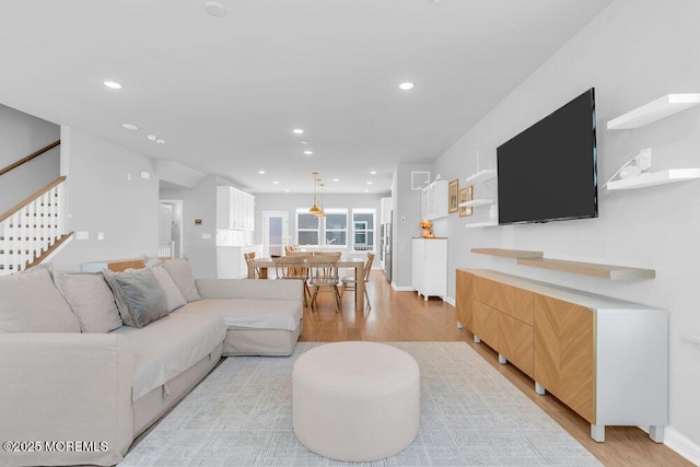 25 Signal Ave, Oceanport, NJ 07757 - living room featuring light wood-type flooring, recessed lighting, and stairs