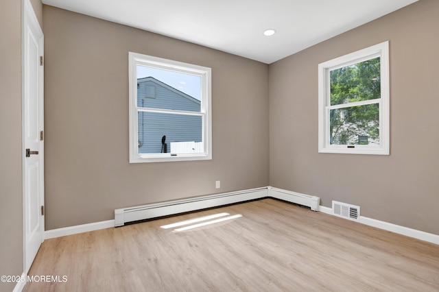 30 Stuyvesant Rd, Brick, NJ 08723 - unfurnished room featuring wood finished floors, a baseboard radiator, and recessed lighting